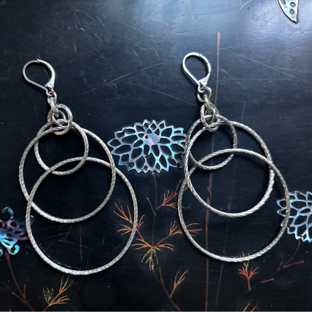 multi hoop silver tone earrings!